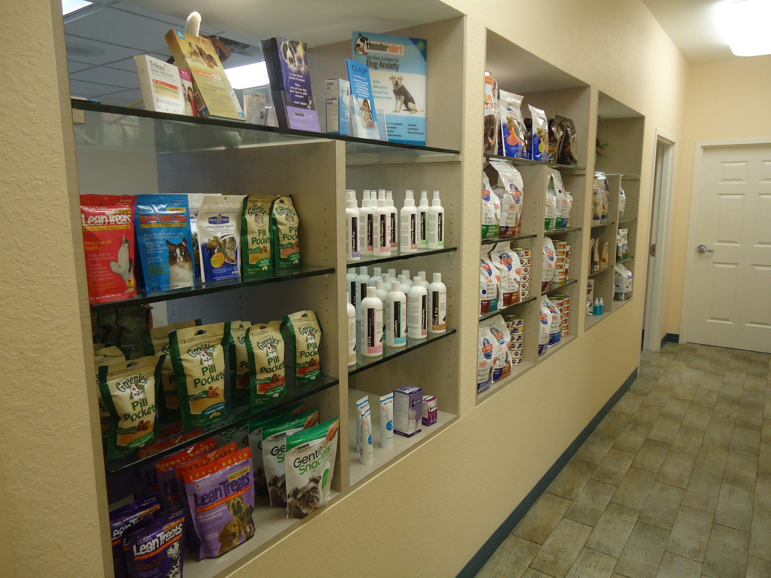 Different products for sale on shelving units - reception area / waiting room